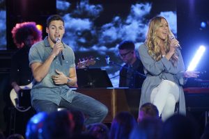 Garrett Jacobs performs with Colbie Caillat