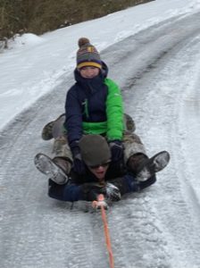 Bossier family sleds during Snowpocalypse 2021.