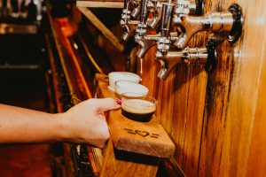 Bossier Parish at Night with a flight of beer from Flying Heart Brewing and Pub.